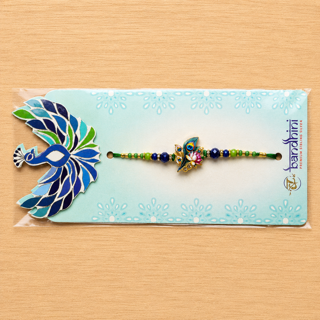 Lotus Designer Rakhi with Blue & Green Beads