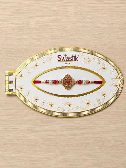 Traditional Red Gemstone Rakhi with Pearl Beads